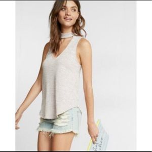 Express sleeveless mock turtleneck with v-cut-out
